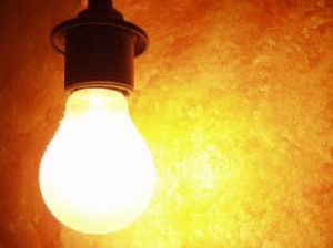 bulb-against-orange-background_247998